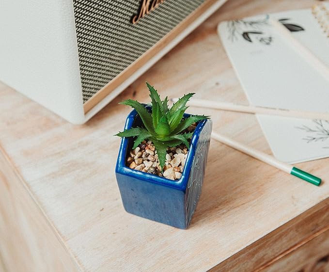 Silver Buffalo Disney Atlantis: The Lost Empire Stone Face 4-Inch Ceramic Mini Planter with Artificial Succulent | Cute Small Flower Pot, Faux Indoor Plants
