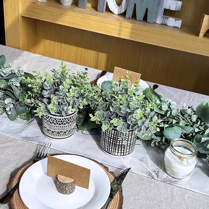 Winlyn Set of 2 Small Potted Plants Artificial Eucalyptus Plant in Black Geometric Ceramic Pots Faux Potted Greenery 7.1" Tall for Desktop Modern Home Office Living Room Kitchen Table Decorations